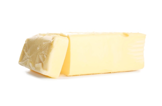 Heerlijke boterstukjes op witte close-up als achtergrond