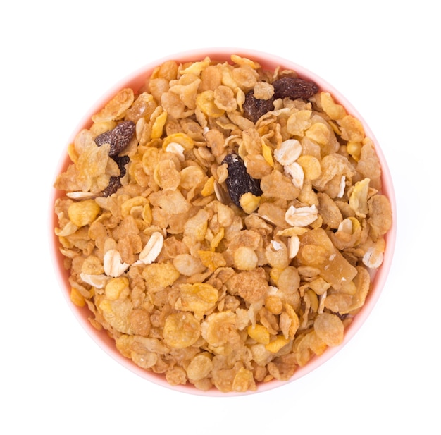 Foto heerlijke muesli muesli granen op kom geïsoleerd op een witte achtergrond