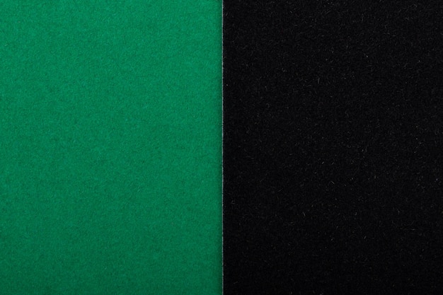 Helder groene en zwarte kleur papier textuur achtergrond. Fluwelen karton