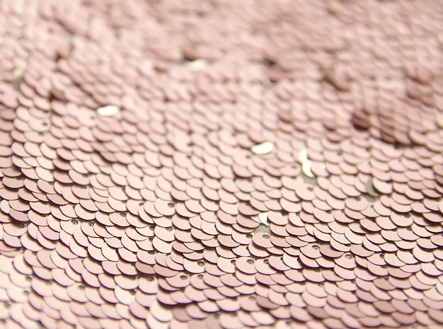 Heldere glanzende ruige textuur van kleurrijke pailletten. Mode stof achtergrond.