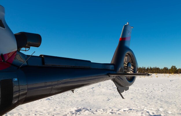 Helicopter tail up close with winter scenery and nature