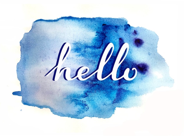 Photo hello greeting lettering on the blue watercolor background