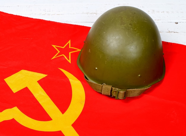 Helmet on the flag of the soviet union