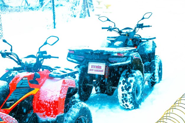 helmet sitting on atv quad bike in mountains