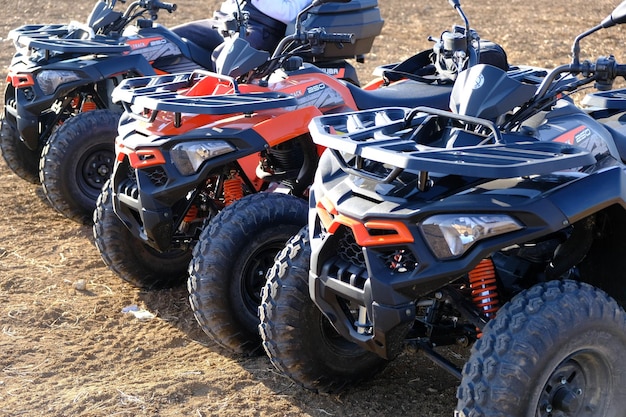 helmet sitting on atv quad bike in mountains