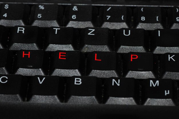 写真 roter schrift auf einer computertastaturのヘルプ