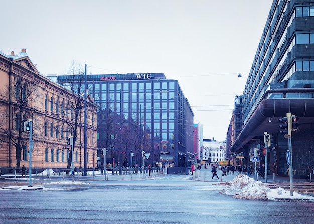 Helsinki, Finland - March 8, 2017: Street and people in city center of Helsinki, Finland in winter.