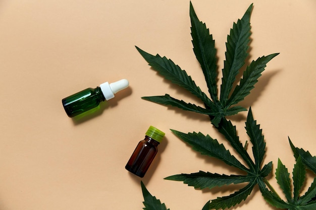 hemp essential oil and cannabis leaves