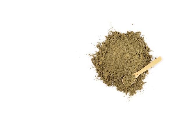 Photo hemp protein powder in a wooden spoon on a white background horizontal orientation top view