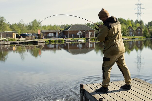 Hengel meer visser mannen sport zomer lokken zonsondergang water buiten zonsopgang vis