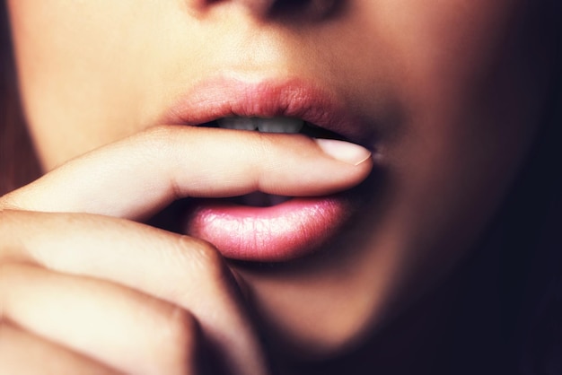 Photo her beauty is all natural cropepd shot of a womans mouth in the studio