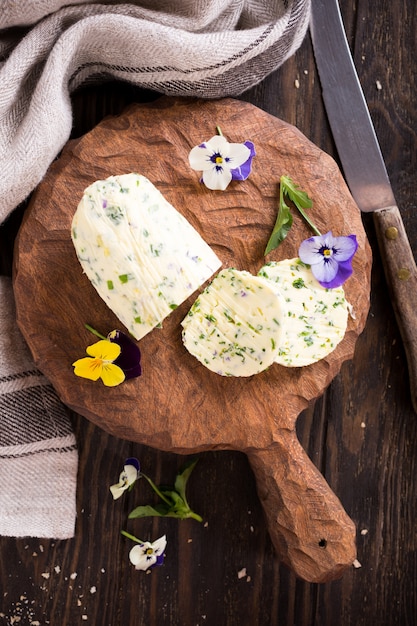 Herb butter with edible flowers