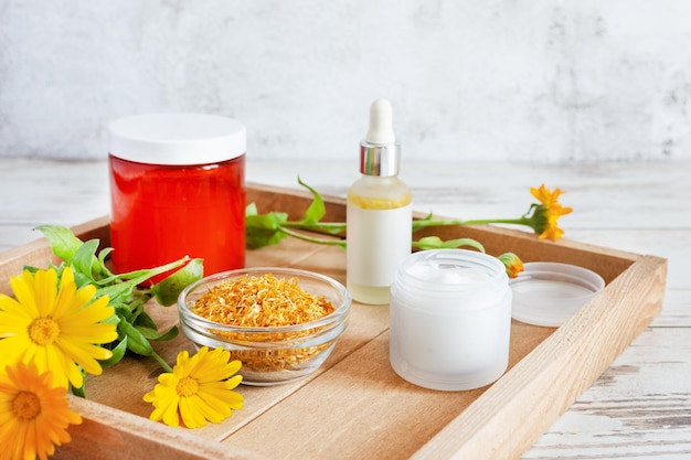 Herbal cosmetics with calendula flowers Natural organic moisturizer cleansing product