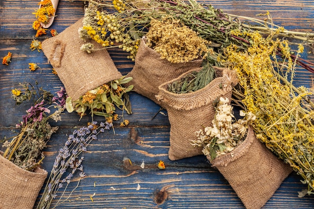 herbal harvest collection and bouquets of wild herbs. alternative medicine. natural pharmacy, self-care concept
