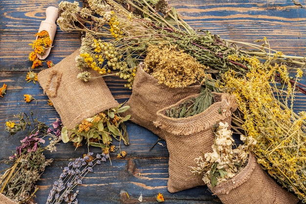 Herbal harvest collection and bouquets of wild herbs. alternative medicine. natural pharmacy, self-care concept