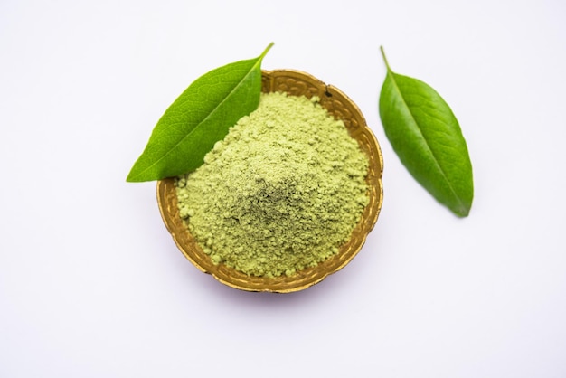 Herbal henna or Mehandi powder in a bowl forming heap, Used for Tattoo or Hair Dye in India