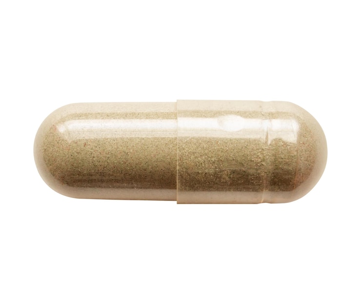 Photo herbal medicine capsule isolated on white background