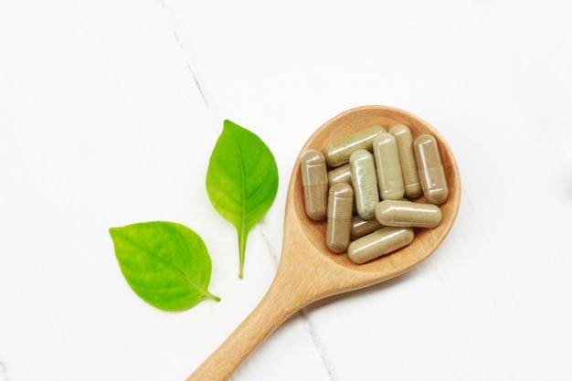 Herbal medicine in capsules for healthy eating with herb