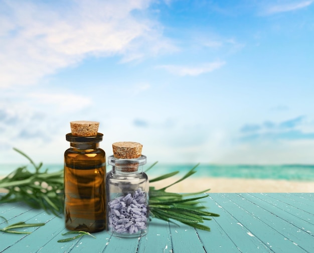 Herbal oil in bottle isolated on background