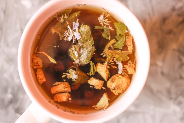 Herbal tea in ceramics cup