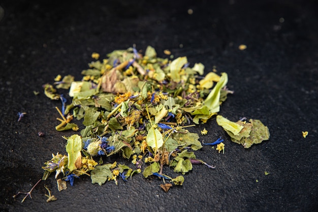 Herbal tea medicinal herbs leaves flowers linden chamomile cornflower mint lemon balm