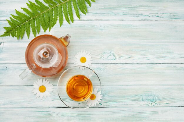 Herbal tea in teapot and cup