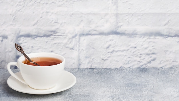 Herbal tea in a white Cup.