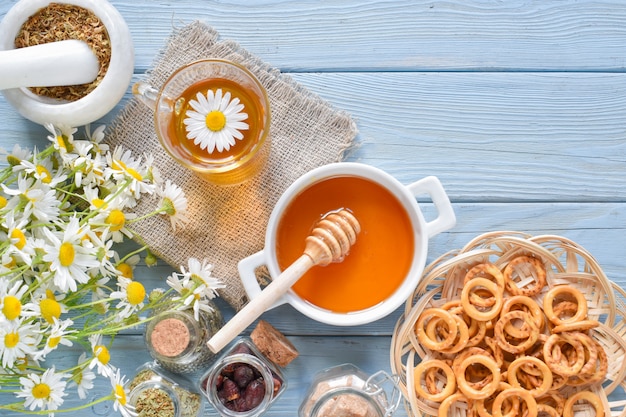 Herbal tea with honey and flowers