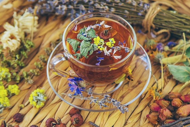 Herbal tea with medicinal herbs and flowers Selective focus