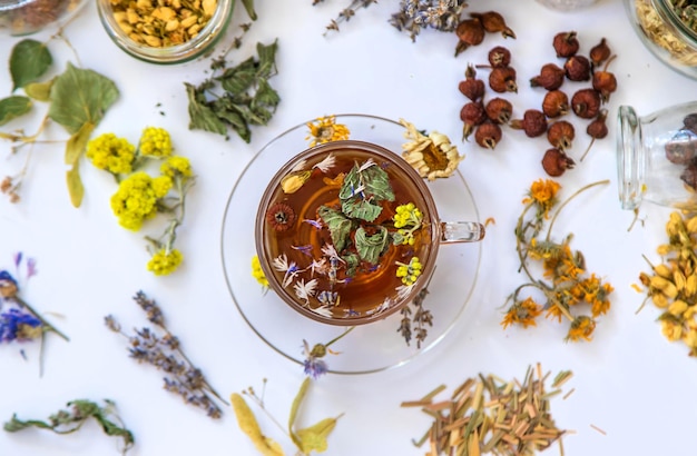 Herbal tea with medicinal herbs and flowers Selective focus