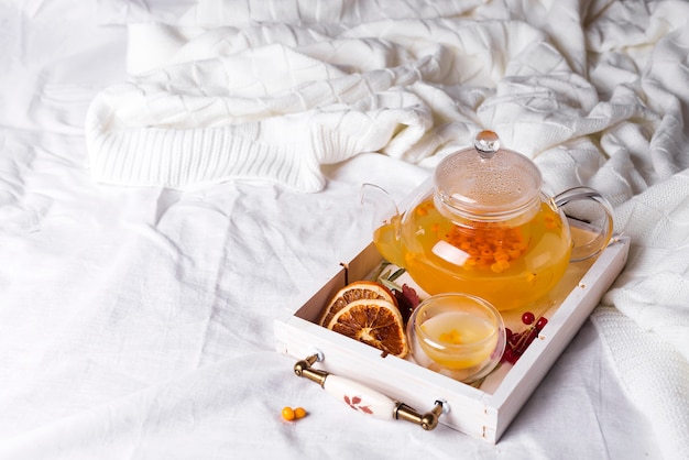 Herbal tea on a wooden tray