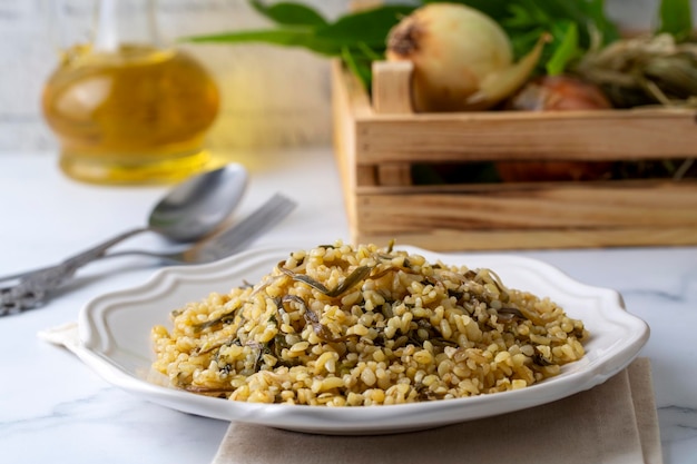 Herbed bulgur pilaf. "Keledos and Ciris herbed" bulgur from Van region of Turkey. Turkish name; Otlu bulgur pilavi