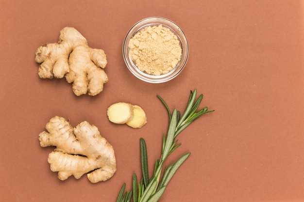 Herbs and spices on brown surface