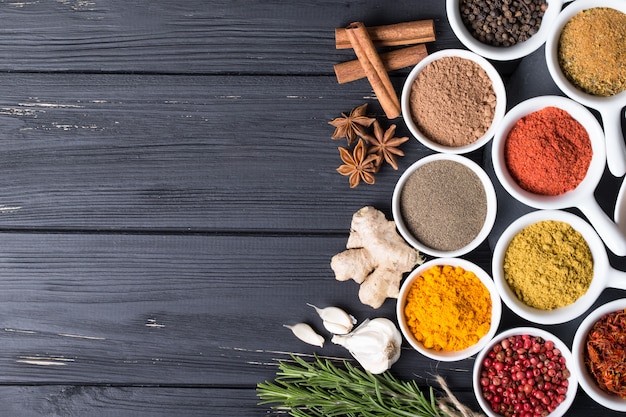 Herbs and spices in ceramic bowls