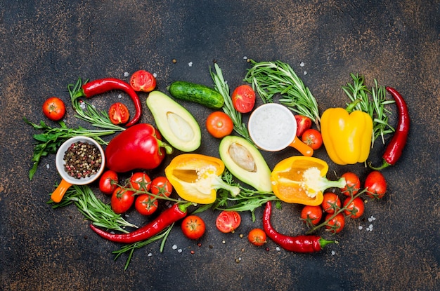 Herbs and spices over dark background Top view