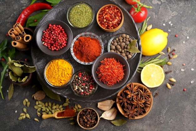 Herbs and spices in metal bowls Food and cuisine ingredients Colorful natural additives