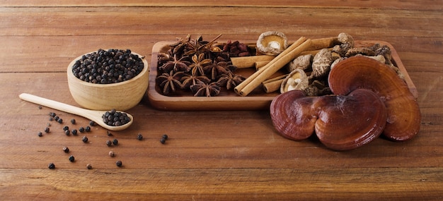 Herbs and spices on a wooden board