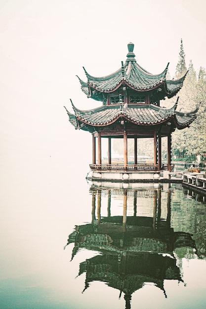 Photo heritage lake scenic area west lake scenery chinese building hangzhou tourism natural scenery