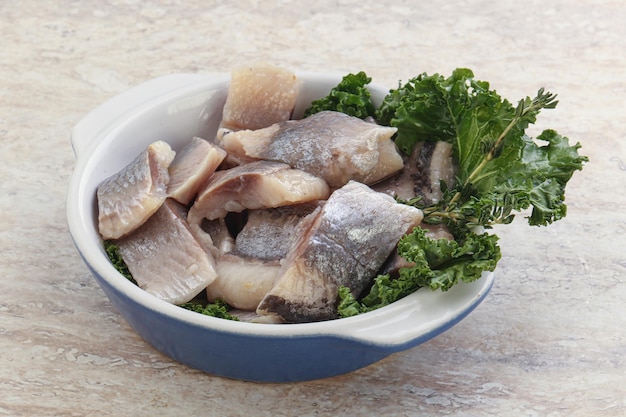 Herring fillet slice on the bowl