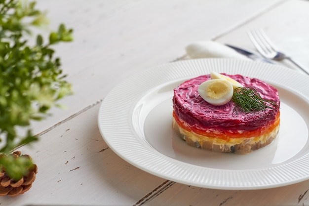 Herring under a fur coat russian herring salad with carrot potato beetroot mayonnaise