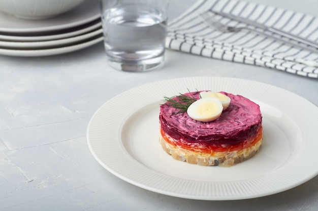 Herring under a fur coat russian herring salad with carrot potato beetroot mayonnaise