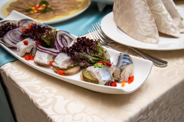 Herring with potatoes and cucumber