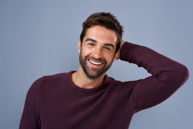 Hes all confidence and positivity Studio shot of a handsome and happy young man posing against a gray background