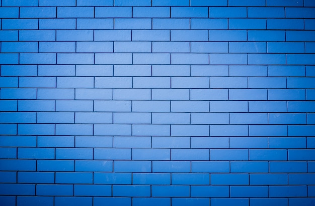 Het beeld van een blauwe bakstenen muur voor gebruik als achtergrond