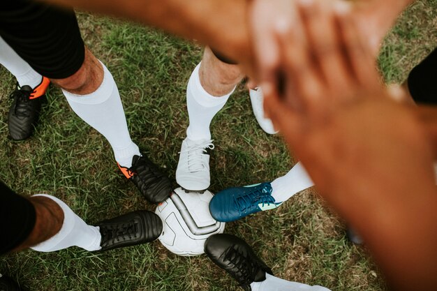 Het concept van de het teamgeest van voetbalsters