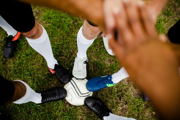 Het concept van de het teamgeest van voetbalsters