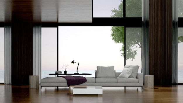 Het interieur van moderne tropische woonkamer en betonnen muur achtergrond en uitzicht op zeegezicht