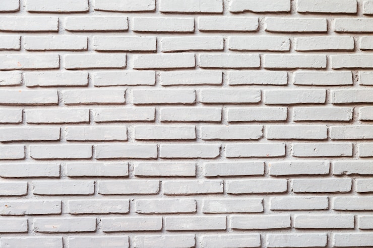 Foto het oude witte gebruik van de bakstenen muurtextuur voor achtergrond