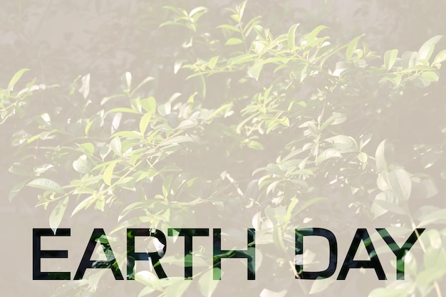 Het woord Earth Day op groene natuur achtergrond Earth Day Ecology concept