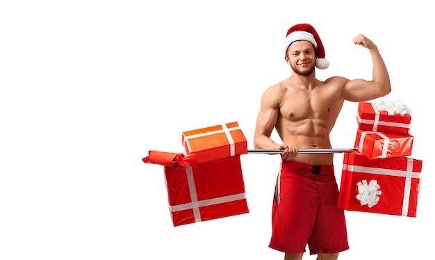 Hete gescheurde kerstman die zijn biceps laat zien